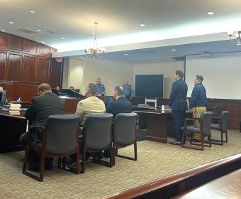 John Vandal, standing at far right, receiving his sentencing hearing date on Jan. 22, 2026. (Jazmin Logan)