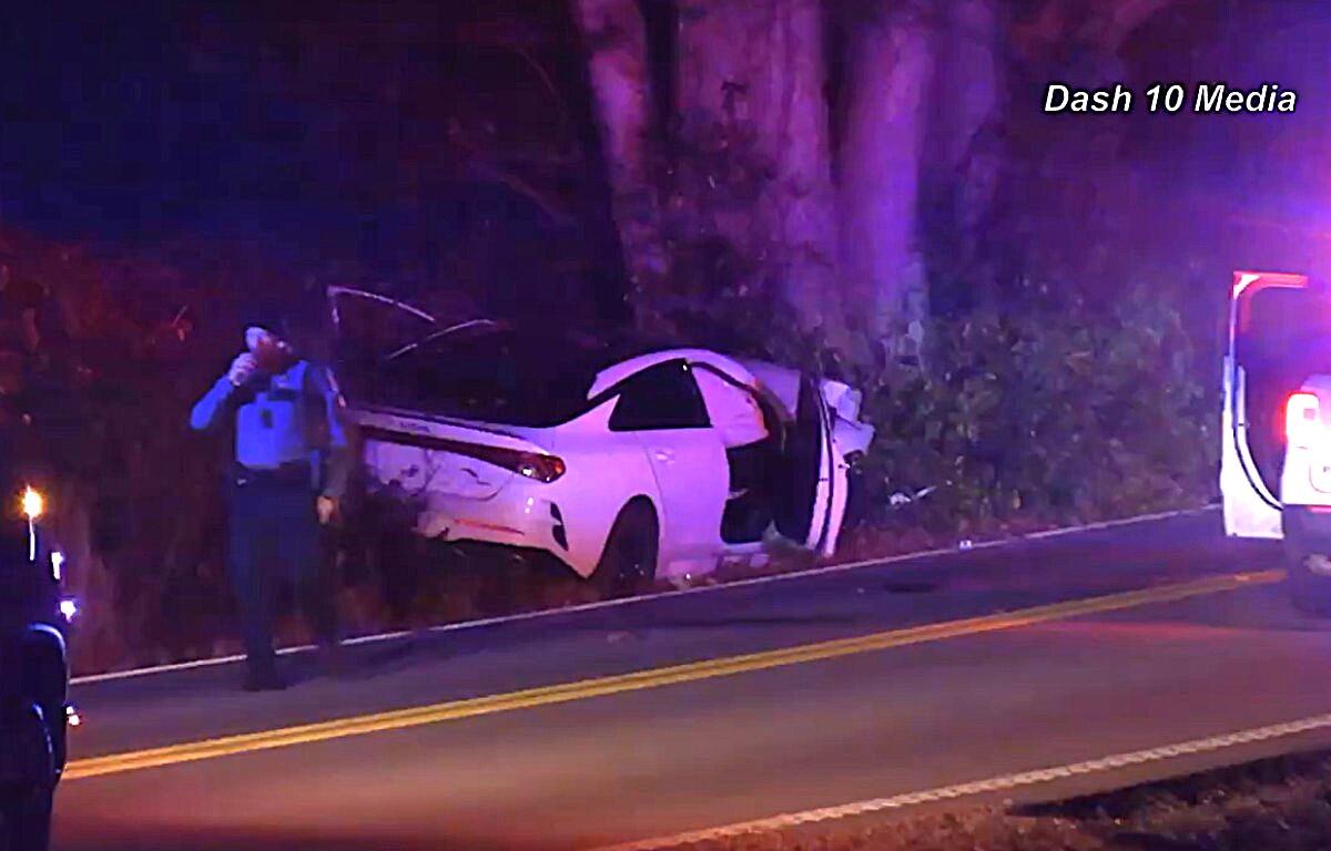 A car crashed into a tree on Rossview Road on Jan. 1, 2026. (Enrique Hernandez, Dash 10 Media)