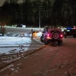 Police and Jeep drivers assist a vehicle during a previous winter storm in Clarksville. (CPD, contributed)