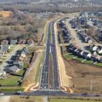 Aerial photo of progress on Spring Creek Parkway as of March 25, 2026. Shown is Trenton Road in foreground, then the parkway, looking east. (City of Clarksville, contributed)