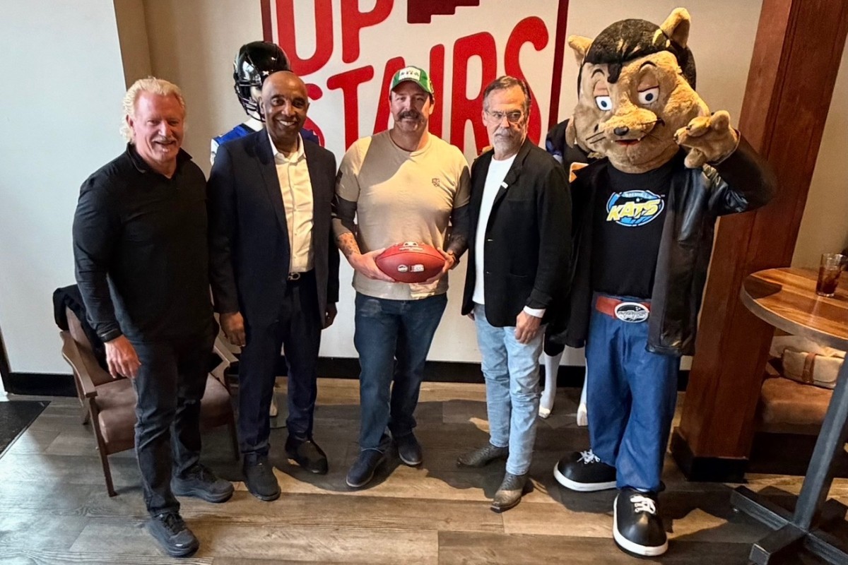 Pictured at a Nashville Kats event at Strawberry Alley in Clarksville on March 17, 2026, are, left to right, Jeff Jarrett, Kats Head Coach and General Manager Darren Arbet, Joe Smith of Jodi's Cabinet Sales, Jeff Fisher and Kool Kat. (Nashville Kats, contributed)