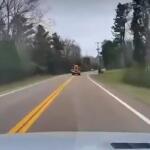 A CMCSS school bus crosses over the yellow lines just before a crash in Carroll County on March 27, 2026. (Rosalee and Zaviel Lugo, contributed via WKRN)