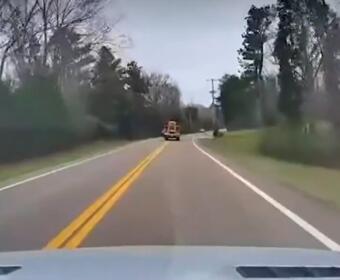 A CMCSS school bus crosses over the yellow lines just before a crash in Carroll County on March 27, 2026. (Rosalee and Zaviel Lugo, contributed via WKRN)