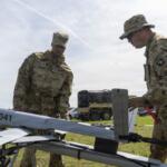 Staff Sgt. Brandon Livingston-Stephenson and Sgt. Abduel Taylor, assigned to 101st Airborne Division, set up the Aevex Atlas precision guided drone system at the Joint Readiness Training Center, Fort Polk, Louisiana, April 5, 2026. (U.S. Army photo by Spc. Mariam Diallo)