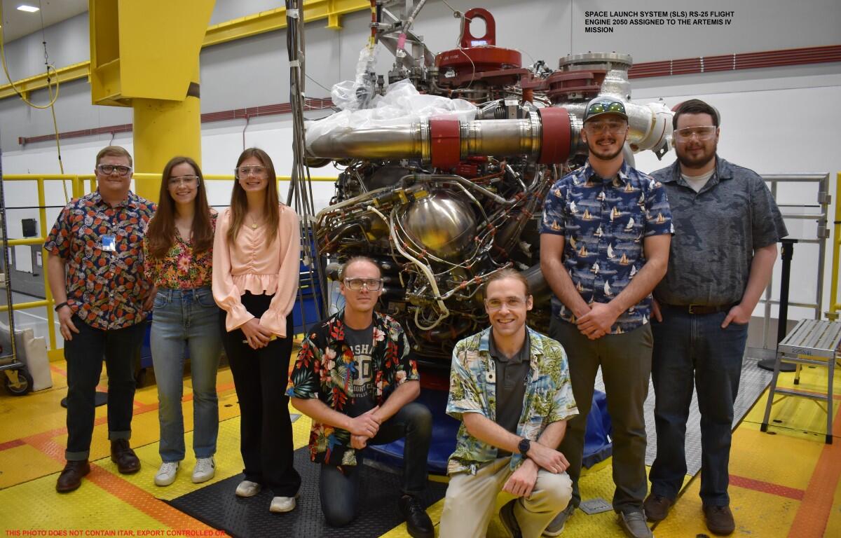 Davis Hunter, kneeling at left in black, with part of his team in 2023 at the Stennis Space Center. Wearing Hawaiian shirts on test days is a tradition for the team. (Contributed, Davis Hunter)