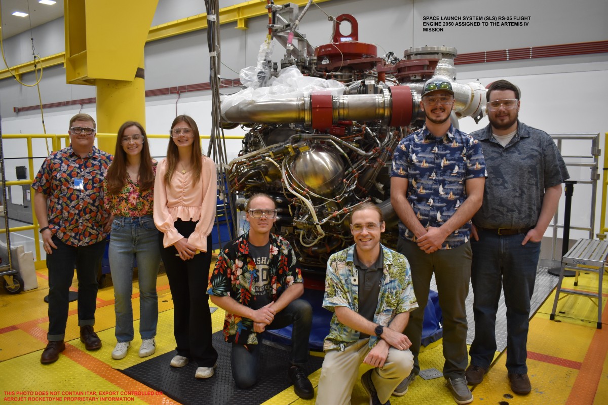 Davis Hunter, kneeling at left in black, with part of his team in 2023 at the Stennis Space Center. Wearing Hawaiian shirts on test days is a tradition for the team. (Contributed, Davis Hunter)