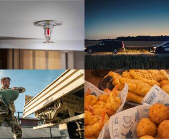 Ceiling-mounted red fire sprinkler head in a room.