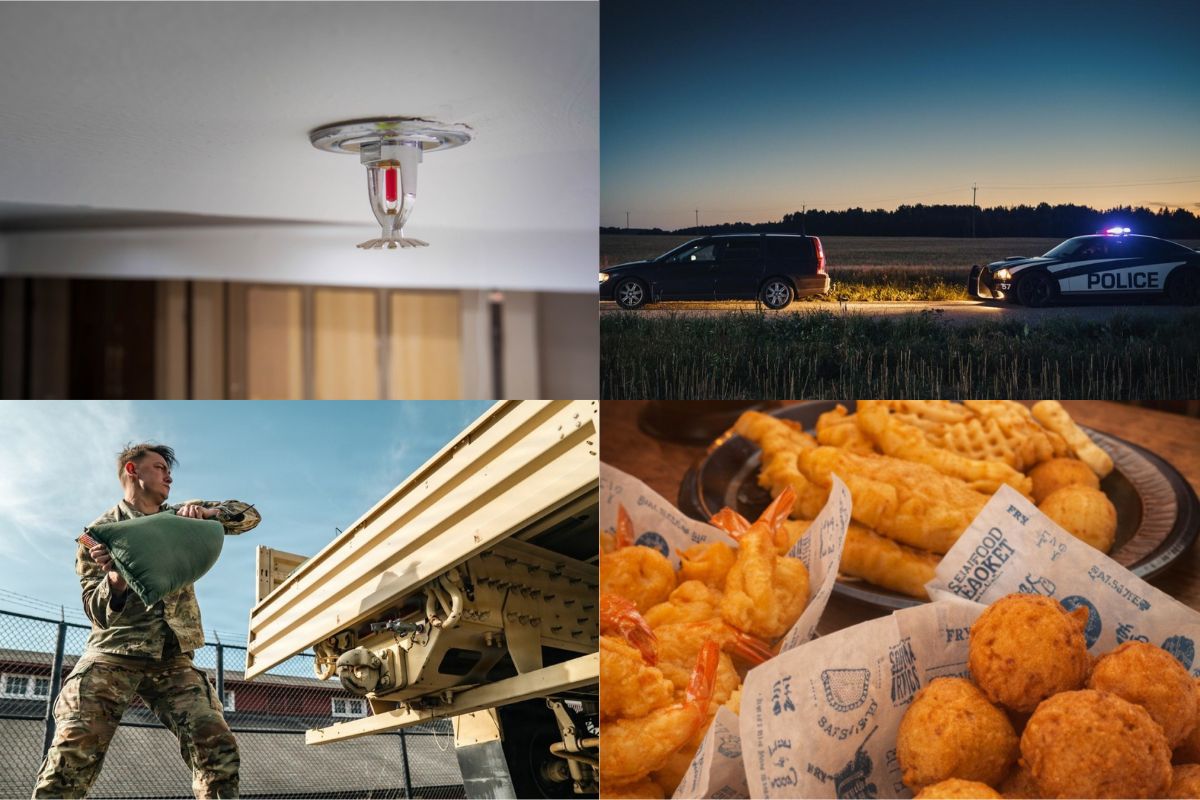 Ceiling-mounted red fire sprinkler head in a room.