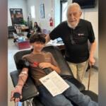 Max Swadley (left) donates blood for the first at the Tennessee River Chapter of the American Red Cross on Madison Street in Clarksville. Max is joined by his grandfather Raymond Swadley on March 16, 2026. (Contributed)