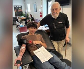 Max Swadley (left) donates blood for the first at the Tennessee River Chapter of the American Red Cross on Madison Street in Clarksville. Max is joined by his grandfather Raymond Swadley on March 16, 2026. (Contributed)
