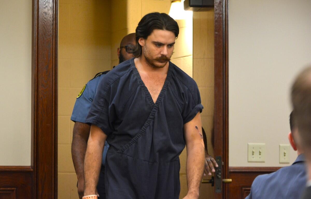 Dalton Eatherly, with his left arm wounded, in court on May 21, 2026. (Jazmin Logan)