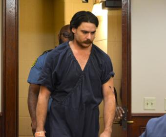 Dalton Eatherly, with his left arm wounded, in court on May 21, 2026. (Jazmin Logan)