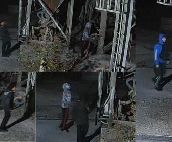 Nighttime collage of people around a damaged building with exposed framing and debris; a person in a blue hoodie stands on the right.