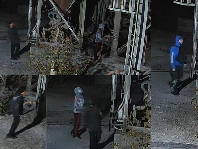 Nighttime collage of people around a damaged building with exposed framing and debris; a person in a blue hoodie stands on the right.