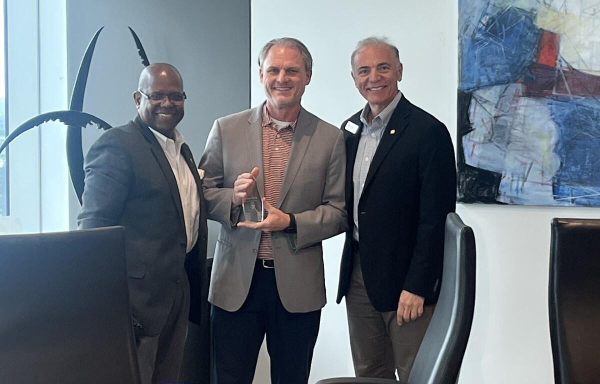 From left to right: Immediate Past Board Chair Tony Wall, Brian Taylor, YMCA of Middle Tennessee President and CEO John Mikos. (Contributed)