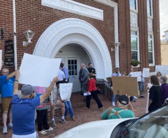 Senior center protest outside City Council Chambers on June 5, 2026. (Christian Brown)