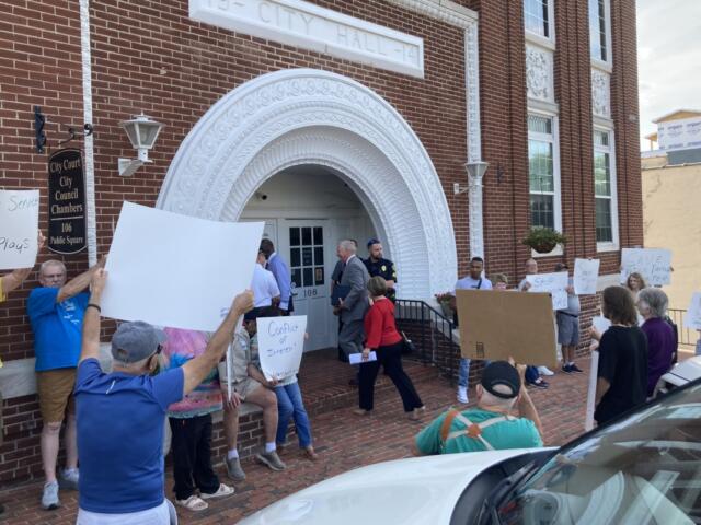 Senior center protest outside City Council Chambers on June 5, 2026. (Christian Brown)