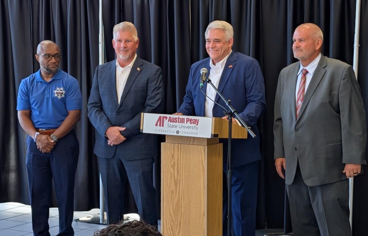Montgomery County sheriff's candidates, from the left, Dexter Mines, Johnny Ransdell and, at right, Mike Oliver, with Jay Albertia, at microphone, at the Chamber of Commerce Meet the Candidates event on July 15, 2026. (Chris Smith)