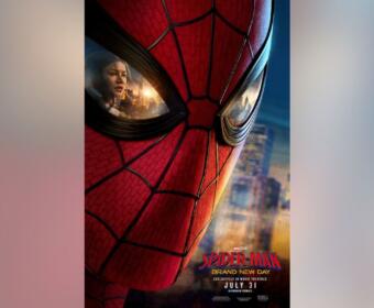 Close-up of Spider-Man’s red mask with a city skyline reflected in the eye lenses; film poster text at the bottom.