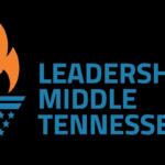 Leadership Middle Tennessee logo: orange flame above blue stripes and star cluster, with blue text 'Leadership Middle Tennessee' on black background
