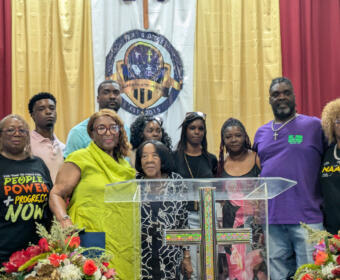 Gloria J. Sweet-Love with Darius Chappell's mother and other family on July 4, 2026. (Nia Holland)