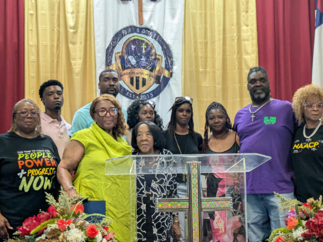 Gloria J. Sweet-Love with Darius Chappell's mother and other family on July 4, 2026. (Nia Holland)