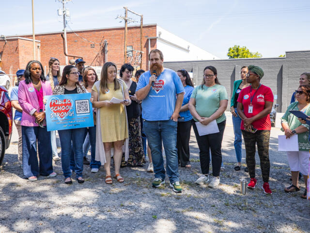 Parents and outside service providers gathered across from the Clarksville-Montgomery County School Board building to voice concerns about new requirements for outside providers working with students in CMCSS schools on August 24, 2026. (Wesley Irvin)