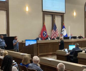 Brice Pruyn addressing the Montgomery County Commission through interpreter Michael Brewer on Aug. 10, 2026. (Christian Brown)