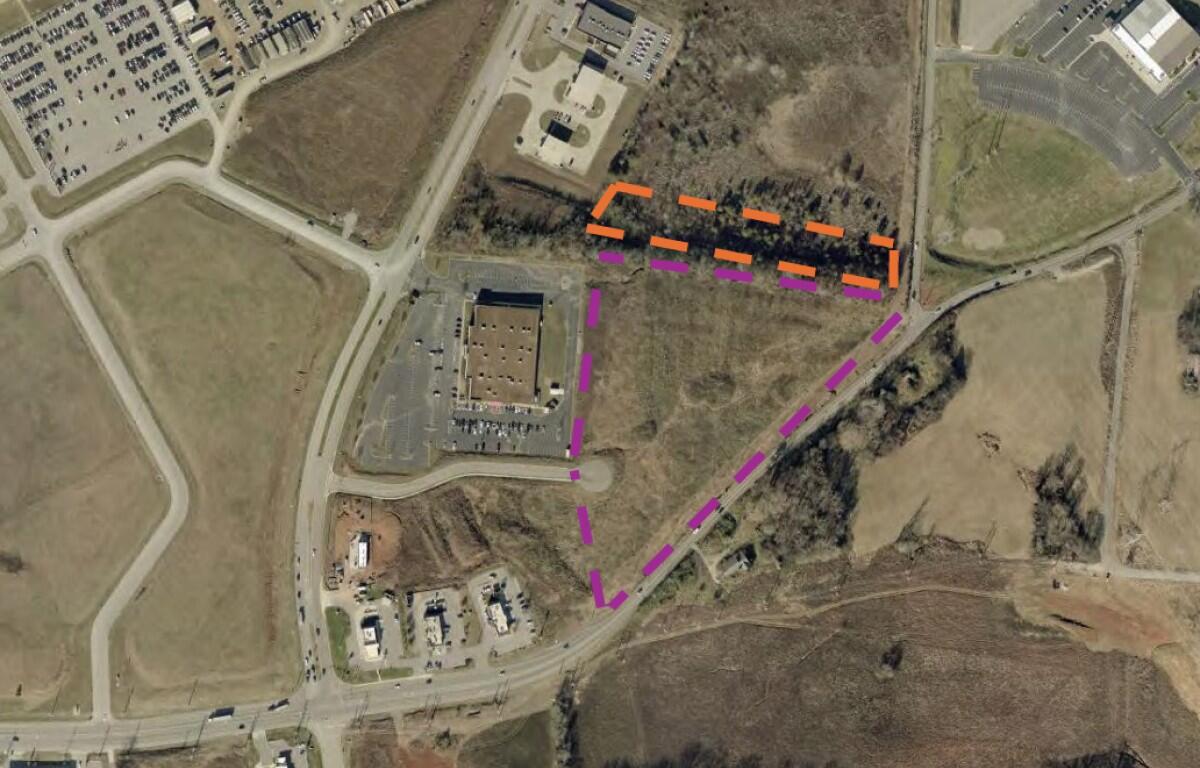 An aerial view of the planned grocery site. The area in purple is 9 acres not needed for ACE Hardware, which will be on Rossview, at bottom, next to Popeye's. The area in orange is roughly 5 acres currently owned by the IDB. (IDB, contributed)