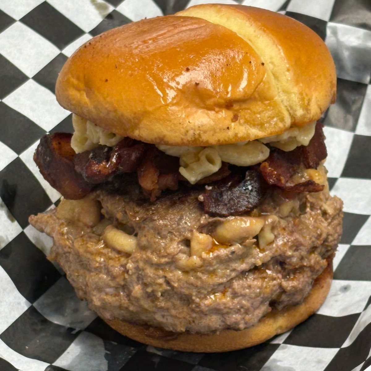 Mac and cheese stuffed burger at Kinlea's Cheesecakes at 125 Franklin St. downtown Clarksville. (Reggie Outland, Contributed)
