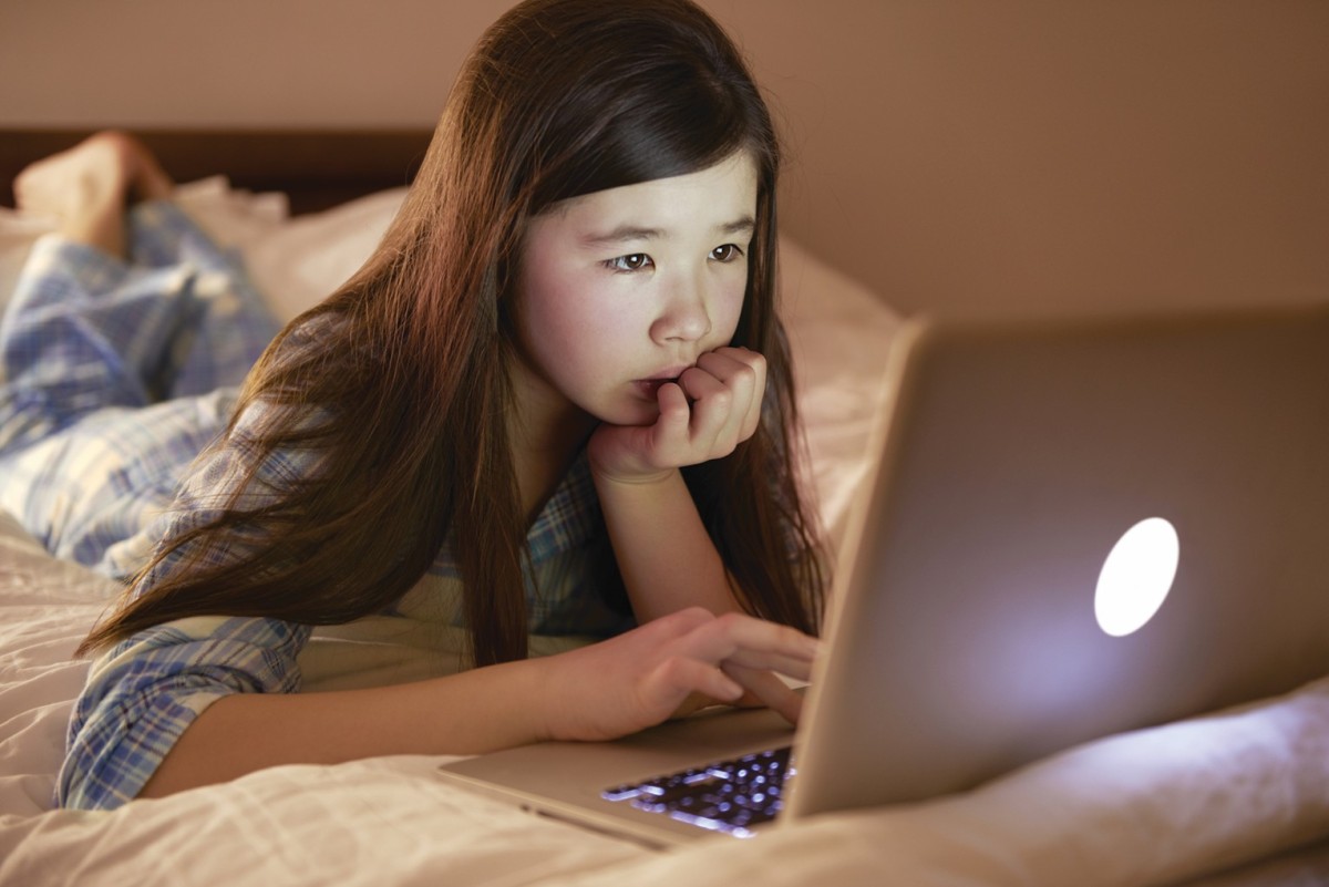 Student using a laptop computer at home. (Metro Creative Services)