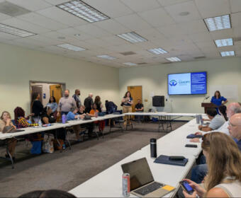 The Canopy Initiative brings partners, public officials and community members together at the Clarksville-Montgomery County Public Library to celebrate progress made during its 100‑Day Challenge. (Nia Holland)