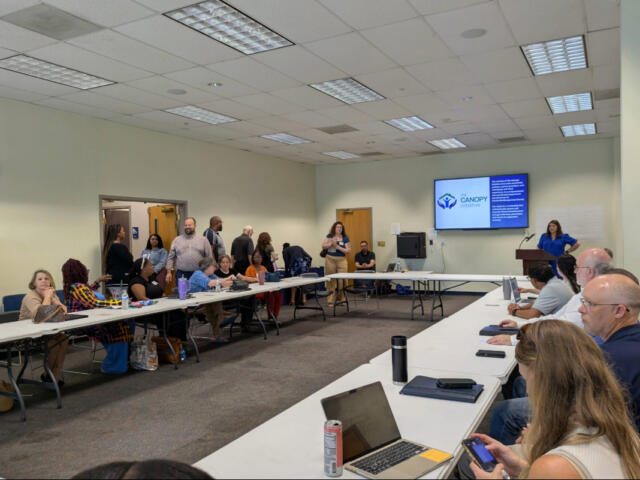 The Canopy Initiative brings partners, public officials and community members together at the Clarksville-Montgomery County Public Library to celebrate progress made during its 100‑Day Challenge. (Nia Holland)