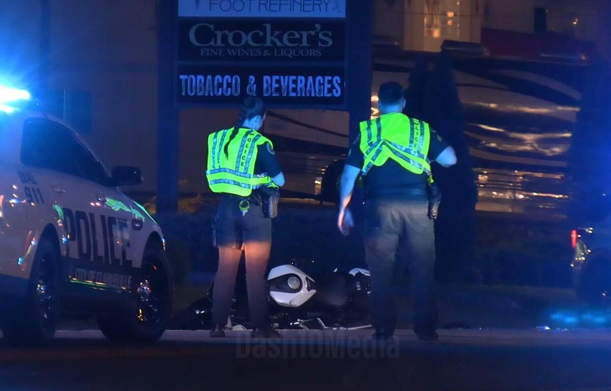A sedan crashed with a motorcycle on Dover Road on Aug. 23, 2026. (Enrique Hernandez, Dash 10 Media)