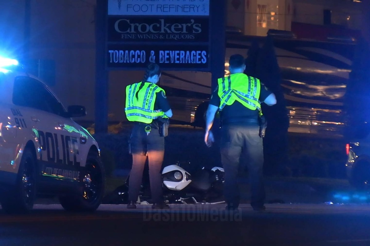 A sedan crashed with a motorcycle on Dover Road on Aug. 23, 2026. (Enrique Hernandez, Dash 10 Media)