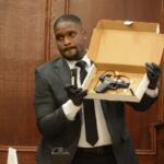 Agent Xavier Greaves holding up the murder weapon for jurors at the Montgomery County Courts Center on Sept. 28, 2026. (Jazmin Logan)