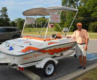 David Welch. Pat Summitt's cousin with her boat at the Fredonia Community Center on Sept. 10, 2026. (Lee Erwin)