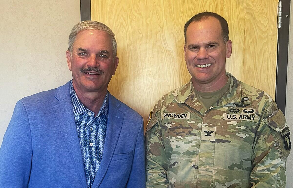 Charlie Koon, left, and Col. Mike Snowden