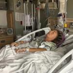 Jamie Ulshoffer in the hospital after a man fell from a tree and landed on her at a festival in Louisville, Kentucky. (Contributed)