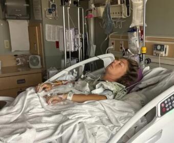 Jamie Ulshoffer in the hospital after a man fell from a tree and landed on her at a festival in Louisville, Kentucky. (Contributed)