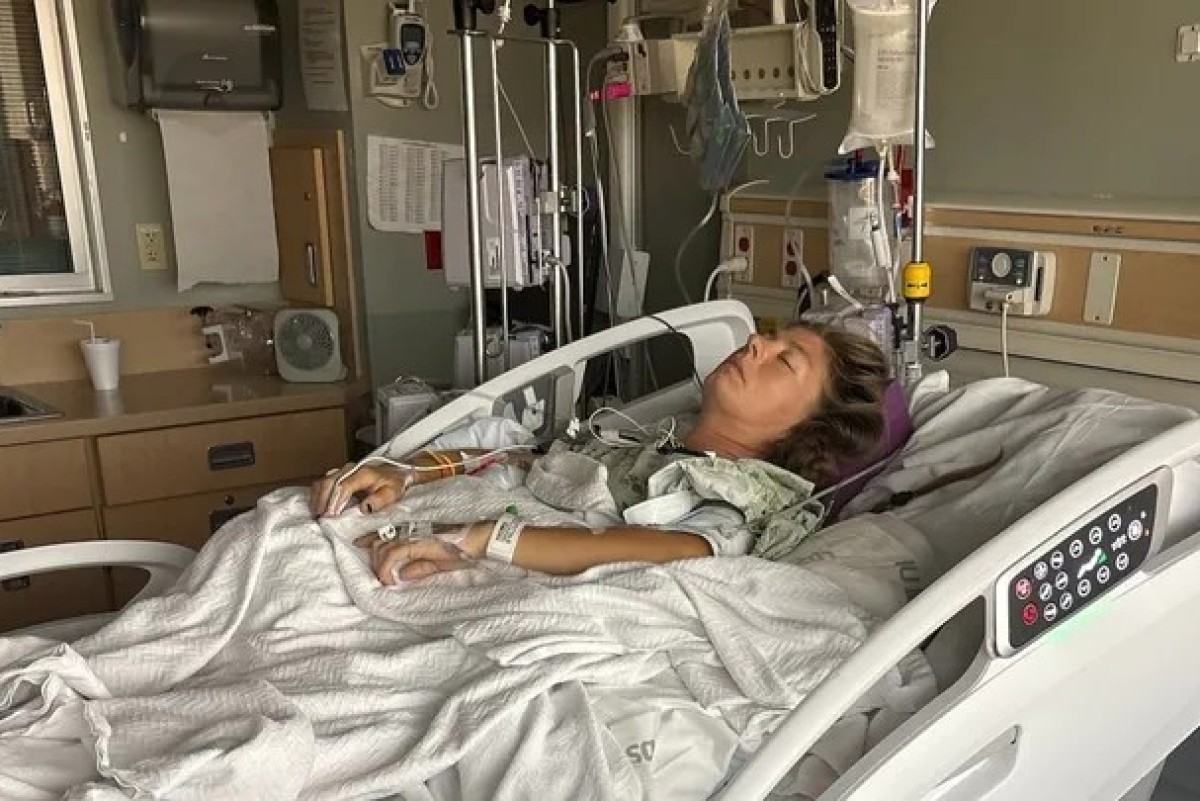 Jamie Ulshoffer in the hospital after a man fell from a tree and landed on her at a festival in Louisville, Kentucky. (Contributed)