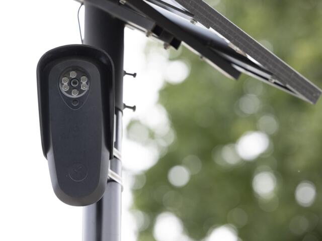 A Flock license-plate-reading camera in August 2026. (Shutterstock)