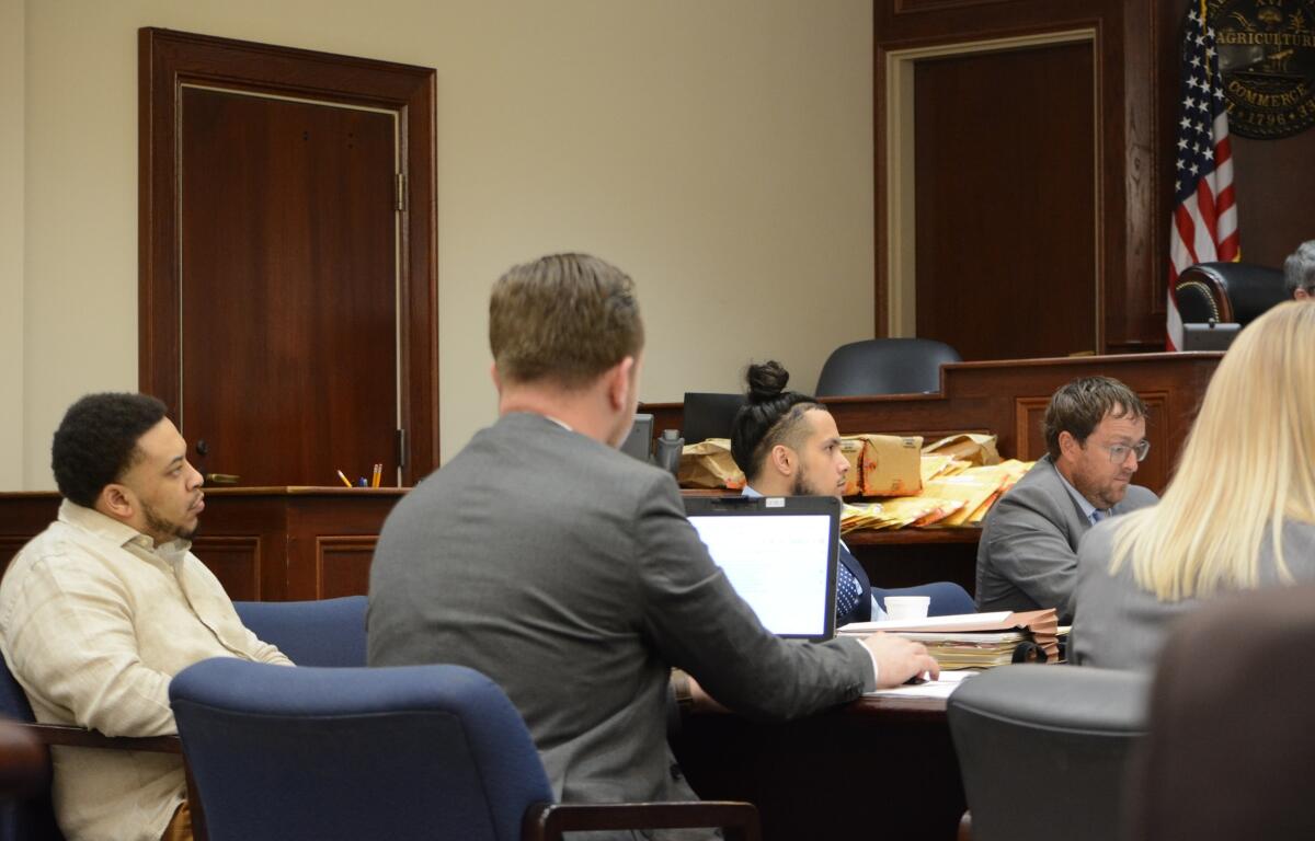 Quantavious Golliday, tan shirt, and Curtis Solberg, blue shirt, at the Montgomery County Courts Center on Oct. 21, 2026. (Jazmin Logan)