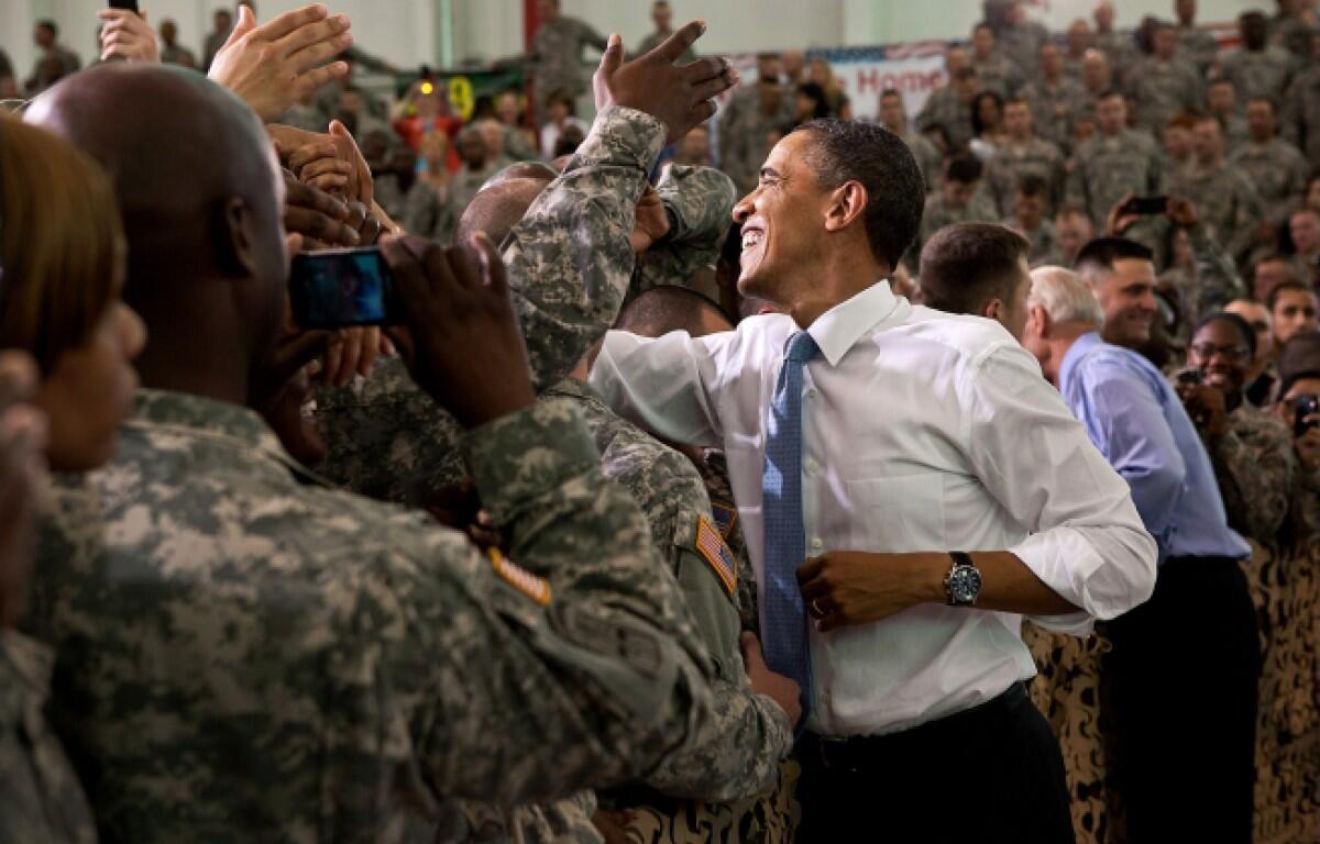 President Barack Obama and Vice President Joe Biden shake hands with the troops following the president's remarks at Fort Campbell, Ky., May 6, 2011. (White House photo by Pete Souza)