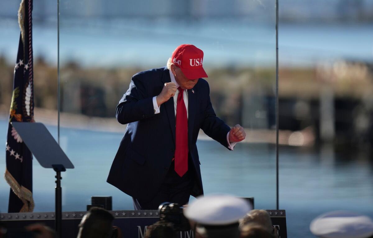 President Donald Trump dances at an event at Sparrows Point Shipyard, Tuesday, Oct. 6, 2026, in Sparrows Point, Md. (AP Photo/Stephanie Scarbrough)