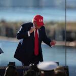 President Donald Trump dances at an event at Sparrows Point Shipyard, Tuesday, Oct. 6, 2026, in Sparrows Point, Md. (AP Photo/Stephanie Scarbrough)