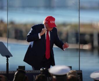President Donald Trump dances at an event at Sparrows Point Shipyard, Tuesday, Oct. 6, 2026, in Sparrows Point, Md. (AP Photo/Stephanie Scarbrough)