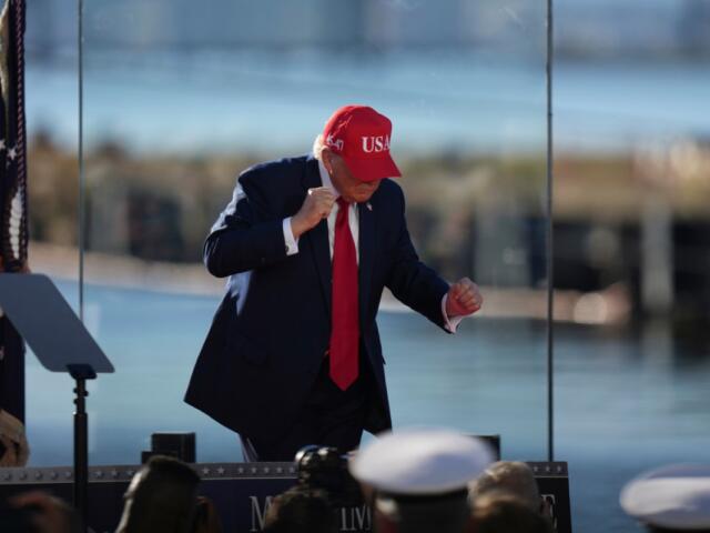 President Donald Trump dances at an event at Sparrows Point Shipyard, Tuesday, Oct. 6, 2026, in Sparrows Point, Md. (AP Photo/Stephanie Scarbrough)