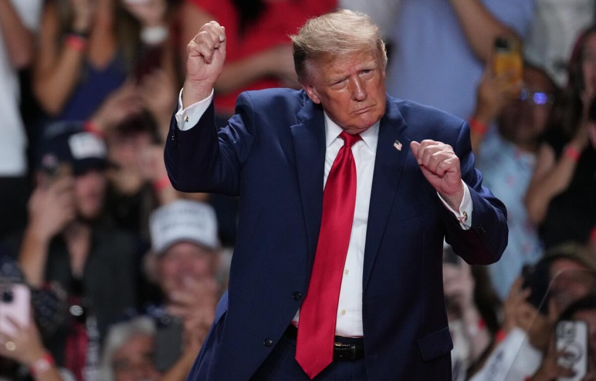 President Donald Trump dances at a campaign rally at the Freeman Coliseum in San Antonio, Wednesday, Oct. 7, 2026. (AP Photo/Eric Gay)