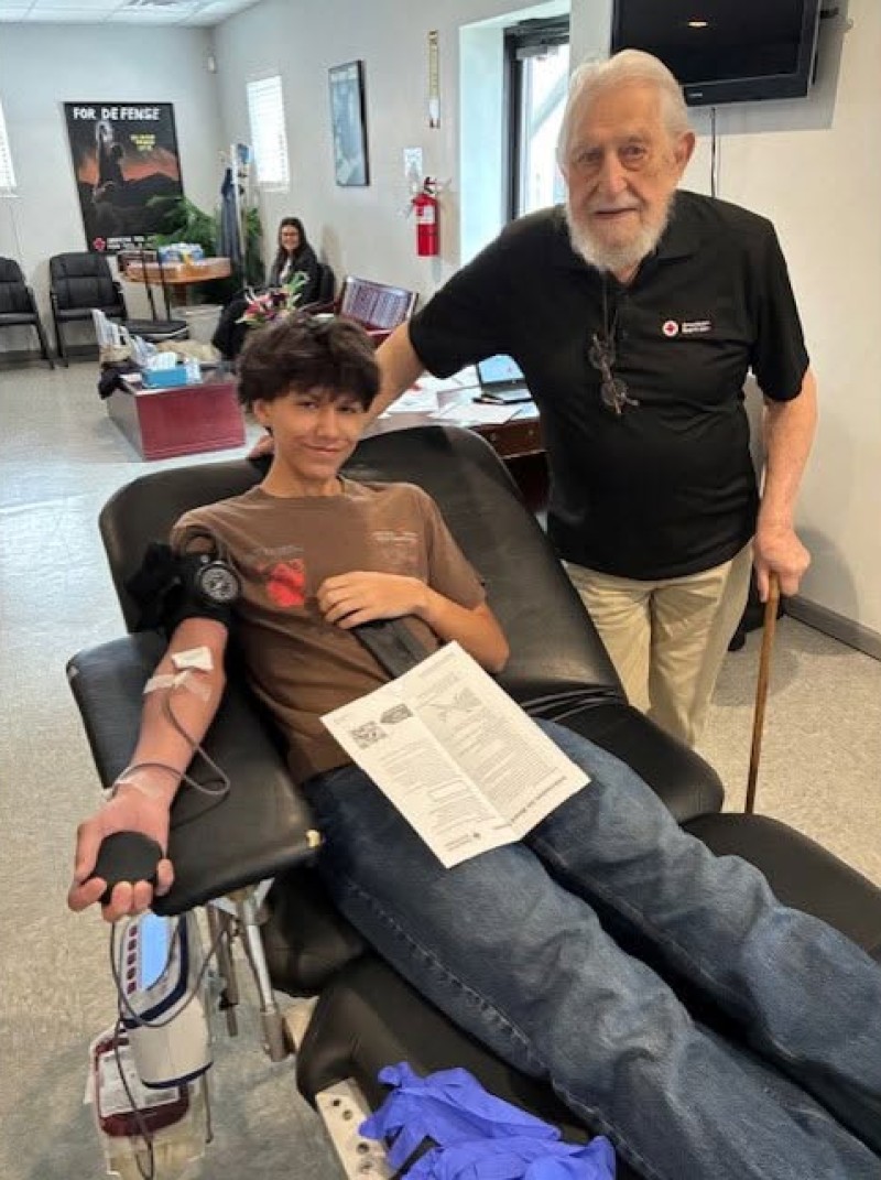 Max Swadley (left) donates blood for the first at the Tennessee River Chapter of the American Red Cross on Madison Street in Clarksville. Max is joined by his grandfather Raymond Swadley on March 16, 2026. (Contributed)